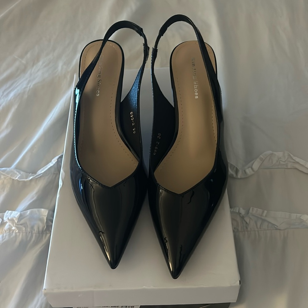 Black patent leather slingback heels